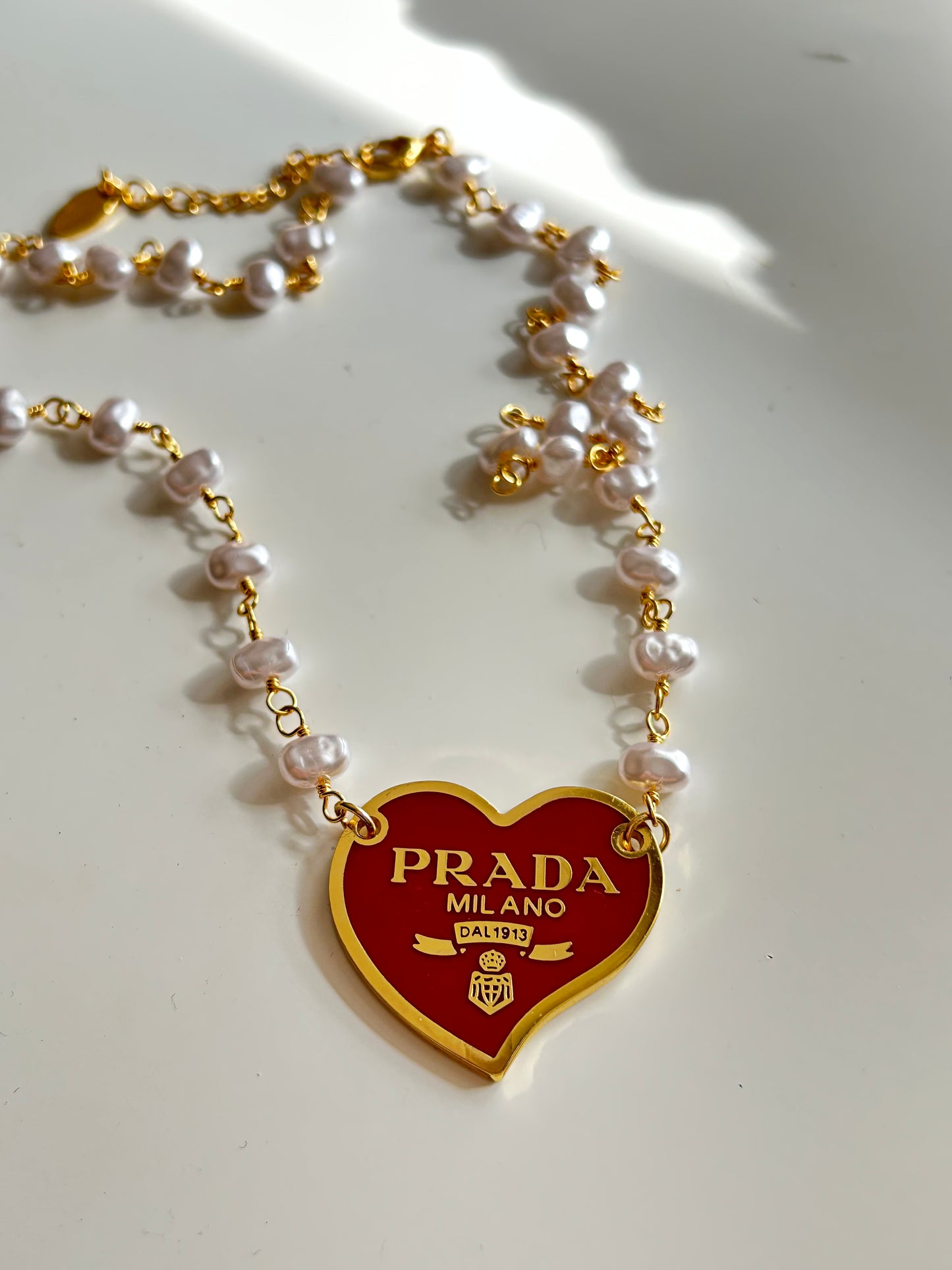 PRADA RED HEART PEARL & GOLD CHAIN