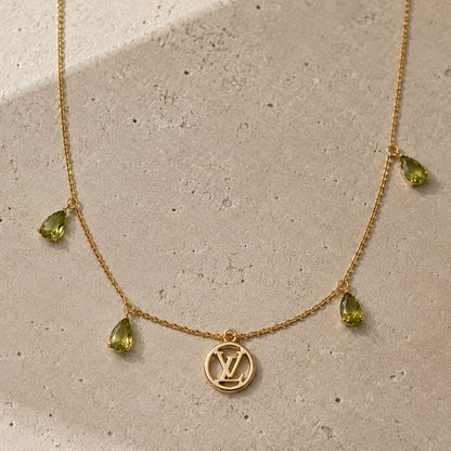 LOUIS VUITTON MINI LOGO GREEN GEMSTONE (RARE)