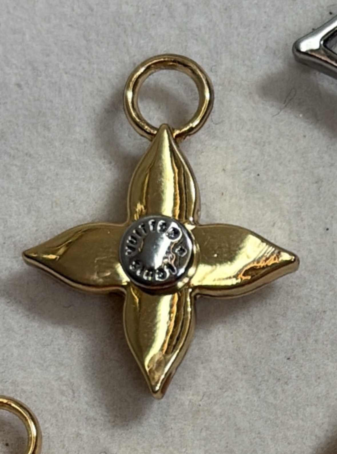 LOUIS VUITTON FLEUR DE MONOGRAM STAR NECKLACE