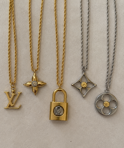 LOUIS VUITTON FLEUR DE MONOGRAM STAR NECKLACE