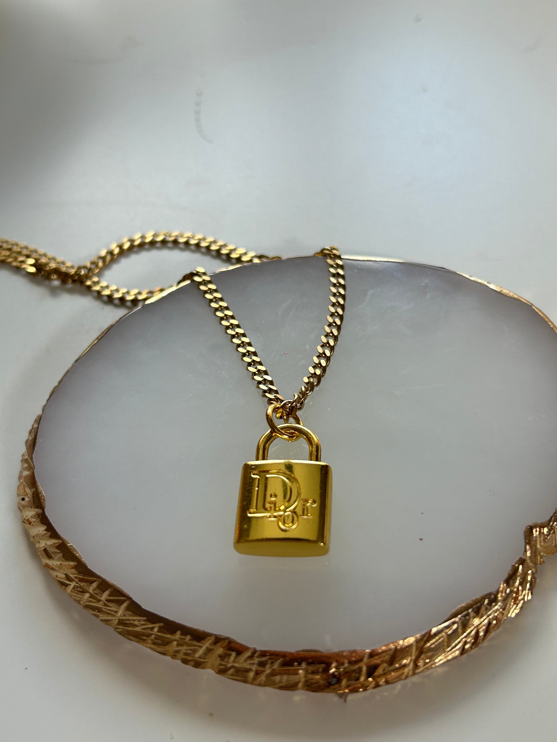 Dior lock pendant clearance